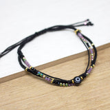 Pulseras Hilo Carlotas - Ojo Turco Negro