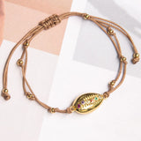 Pulseras Hilo Nudo - Caracol dorado circoncitos Hilo Marrón