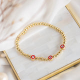 Pulseras Esfera - Tres Ojitos Turcos Rojos