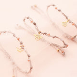 Pulseras Hilo Nudo - Kids con detalle de Muranos Melón y Dije