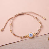 Pulseras Hilo Nudo - Beige Ojo turco blanco celeste