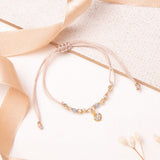 Pulseras Hilo Nudo - Isabela Beige Combinación Celeste Corazón