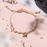 Pulseras Hilo Nudo - Beige Libélula circón