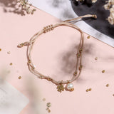 Pulseras Hilo Nudo - Beige Trébol y perla