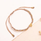 Pulseras hilo Tejidas - Corazon dorado beige