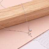 Collares - Cruz y esfera circones Silver