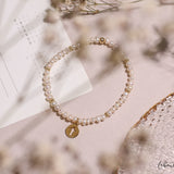 Pulseras Perla - Cruz